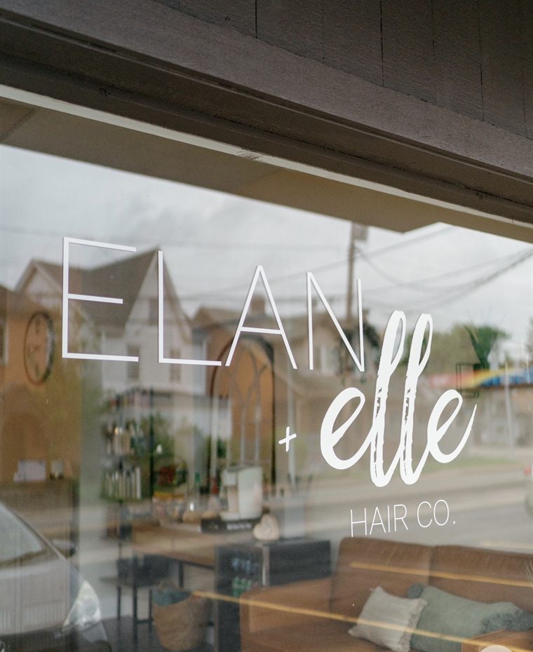 The ELAN + elle hair co. window on Mt. Royal Blvd